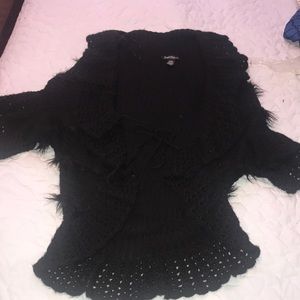 Black sweater jacket with fur accents